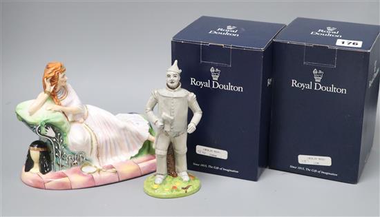 Four Royal Doulton from The Wizard of Oz: Tin Man, The Lion, Scarecrow and Dorothy and a Peggy Davies model of Lillie Langtee (5)